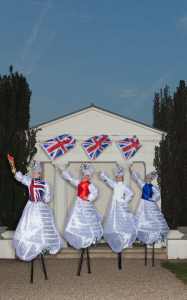 British Beauty Stilt Walkers for hire. Our Union Jack-themed stilt walkers are available to book for British-themed events, family fun days or Easter events in London & the UK.