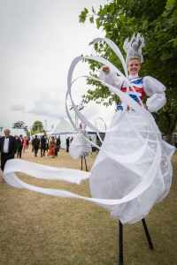 British Beauty Stilt Walkers for hire. Book our themed stilt walkers for family fun days in the UK & London.