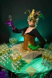 Carnival-themed human drinks table for hire. Book our Mardi Gras-themed living table for award ceremonies in London & the UK.