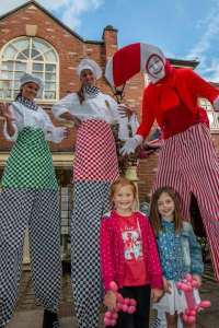 Chef stilt walkers for hire. Our chef & candy cane stilt walkers are available to book for picnic events in London & the UK.