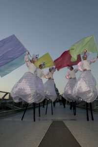 LED Stilt Walkers for hire. Our LED walkabouts acts are available to book for family fun days in London & the UK.
