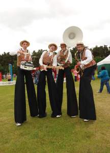 Stilt and beyond for hire. Our comedy stilt walkers are available to book for corporate functions, shopping centre events or store openings in London & the UK.