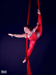 UK-based acrobatic aerial silk performer for hire for award ceremonies.