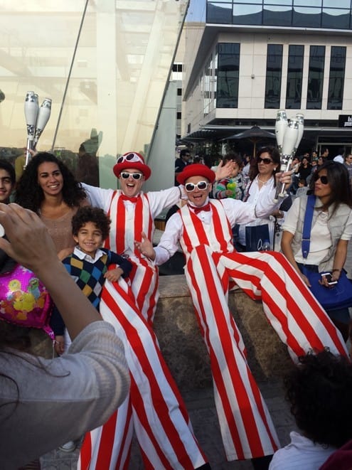 Juggling stilt walkers for hire. Our circus-themed stilt walkers are available to book for shopping centre events in London & the UK.