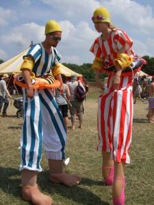 Swimmer stilt walkers for hire. Our Dipping Dynamos are available to book for summer festivals in the UK & London.