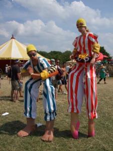 1940's-themed stilt walkers for hire. Our Swimmer stilt walkers are available to book for picnic-themed events in the UK & London.