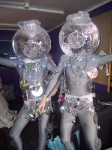 Hire our dancers for your corporate event. Our Disco Ball Dancers are available to book for your private party in London & the UK.