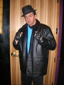 Rocky impersonator for hire. Our Sylvester Stallone lookalike is available to book for movie-themed events, weddings or private parties in London & the UK.