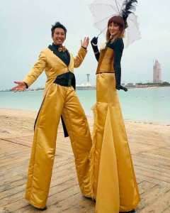 Fancy stilt walkers for hire. Book our Golden Stilt Walkers for gala dinners in the UK & London.