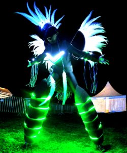 LED Stilt Walkers for hire. The Glow Quetz are available to book for nightclub events in the UK & London.