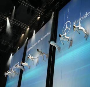 Aerial acrobats for hire. Our Vertical Aerial Wall Show is available to book for bespoke events in the UK & London.