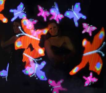 Glow show for hire. Our Glow Show is available to book for corporate events in the UK & London.