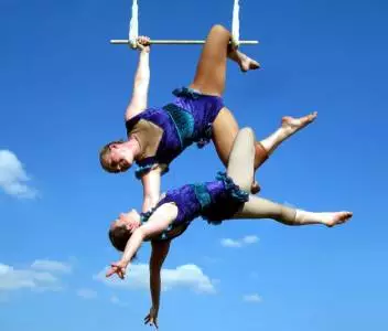 UK-based aerial trapeze act for hire for corporate events.