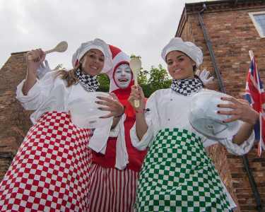 The Gourmet Chefs for hire. Our Gourmet Chef stilt walkers are available to book for family fun days, Easter events or picnic events in London & the UK.