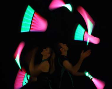 LED Poi dance show for hire. Our LED Poi Jugglers are available to book for gala dinners in London & the UK.