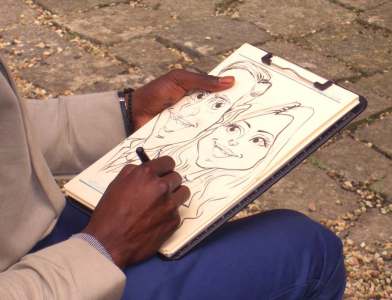 Expert Caricaturist for hire. Book our caricaturist for exhibitions, product launches or corporate events in London & the UK.