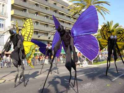 Butterfly Stilt Walkers for hire. Our animal stilt walkers are available to hire for family fun days, shopping centre events or music festivals in London & the UK.