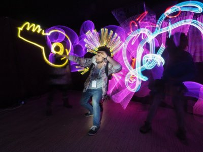 Light Painting for hire. Our Light Painting Artist is available to book for gala dinners, corporate events or award ceremonies in London & the UK.