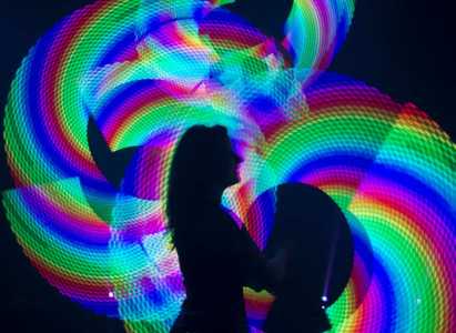 LED Glow Poi Show for hire. Our LED Poi dancers are available to book for brand activations, corporate events or award ceremonies in London & the UK.