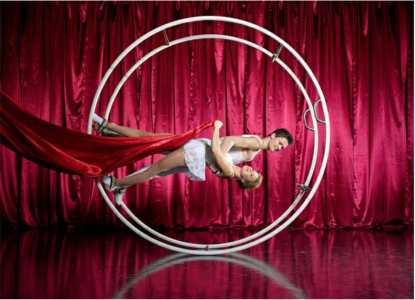 Holland-based Cyr wheel show for hire. Book our aerialist circus performers for award ceremonies, corporate events or product launches in the UK & internationally.