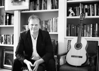 UK-based classical guitarist available to hire for corporate events.