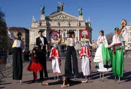 Book parade stilt walkers, available internationally.