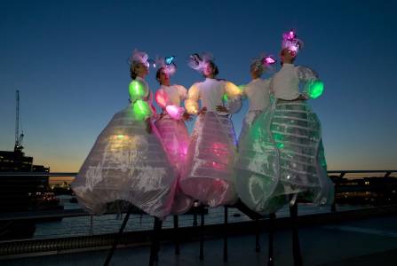 Vibrant Stilt Walkers for hire. Our LED light-up stilt walkers are available to book for corporate events in London & the UK.