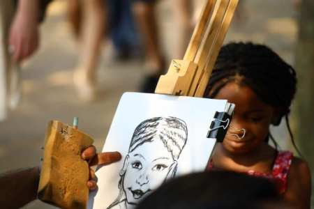 Caricature Artist for hire. Book our caricaturist for weddings in the UK & London.