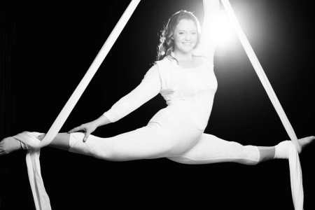 Hire our aerial acrobat performer for gala dinner events across the UK & worldwide.
