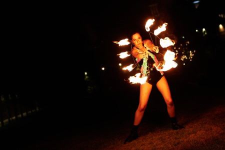 Our circus performer will dazzle with their fire show