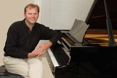 Our pianist is available to hire for your corporate function in London & the UK.