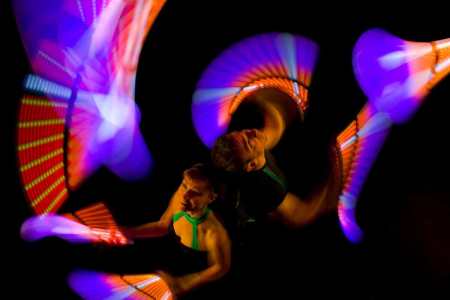 LED Poi juggling show for hire. Book our LED Poi Jugglers for conferencing events in the UK & London.
