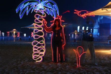 Artistic performer for hire. Our Light Painting Artist is available to book for gala dinners in the UK & London.