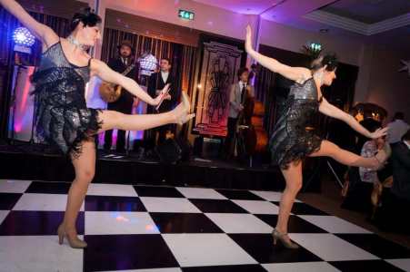 The Extravagant Gatsby Dancers for hire. Book our themed dancers for gala dinners in the UK & London.