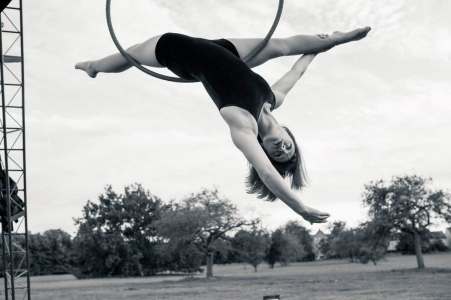 The Versatile Aerialist for hire. Book our aerial hoop performer for corporate events in London & the UK.