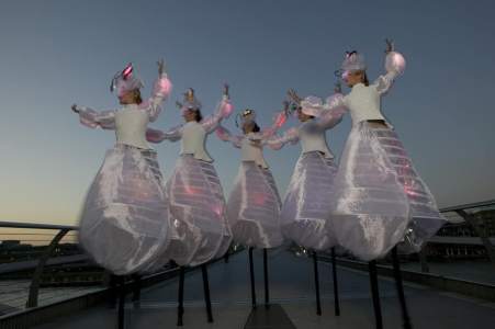 Rio-themed LED Stilt Walkers for hire. Our stilt walkers are available to book for carnivals in the UK & London.