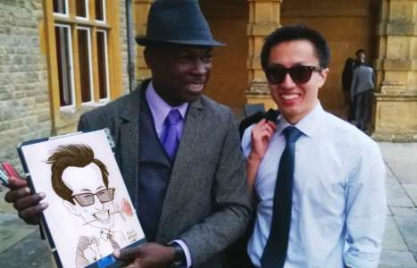 Femi is a talented caricature artist based in London and is available for events.
