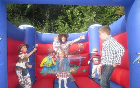Cowboy Bouncy Castle for hire. Our bouncy castle is available to book for family fun days in London & the UK.