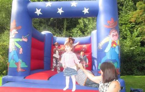 Book our cowboy bouncy castle for family fun days in London & the UK.