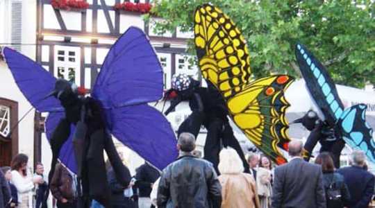 Book our Butterfly Stilt Walkers for children's parties in London & the UK.