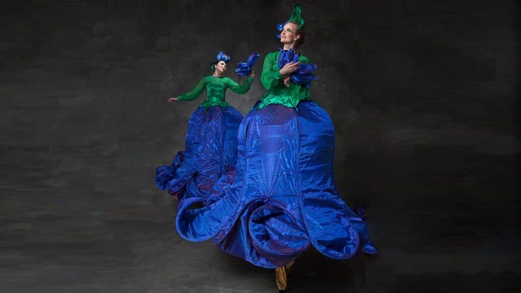 Flower Stilt Walker available to hire as a duo to perform at spring and easter events in the UK.