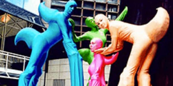 Multi-Coloured-Stilt-Performers