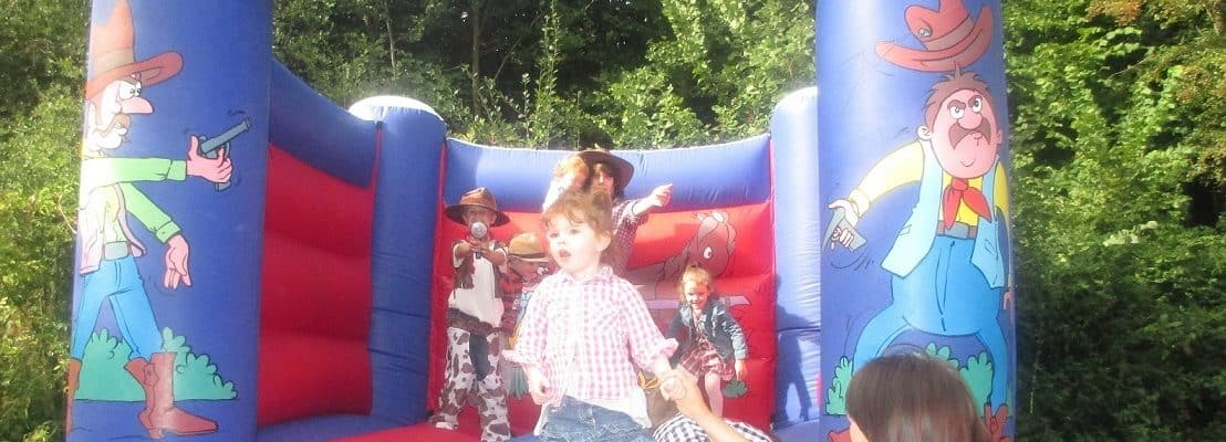 Book our cowboy bouncy castle for family fun days in London & the UK.