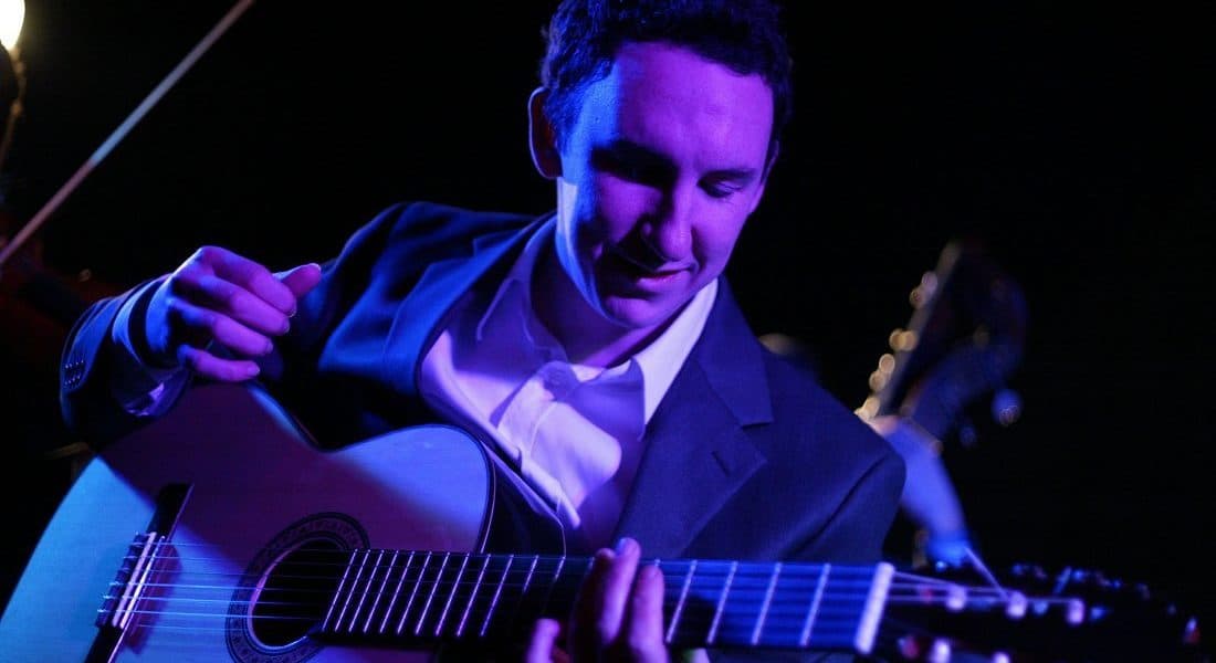 UK-based classical guitarist for hire. Book our solo Spanish guitarist for corporate events or weddings.