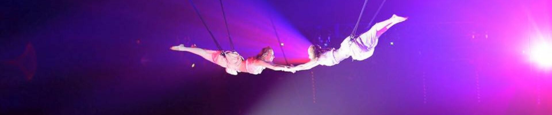 Acrobats-Hold-Hands-Mid-Air Acrobats-Hold-Hands-Mid-Air