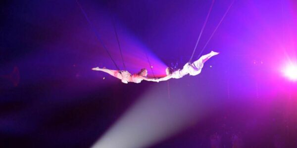 Acrobats-Hold-Hands-Mid-Air