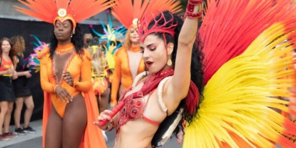 Carnival-Dancer-Performing-In-Red-And-Yellow-Outfit