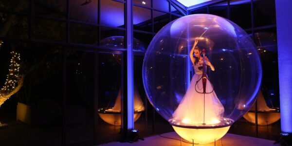 Cello-Player-Performing-Inside-Bubble