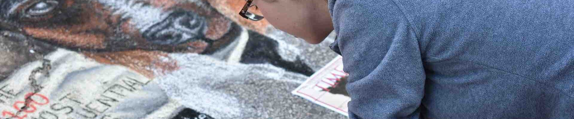 Chalk-Artist-Drawing-On-Pavement