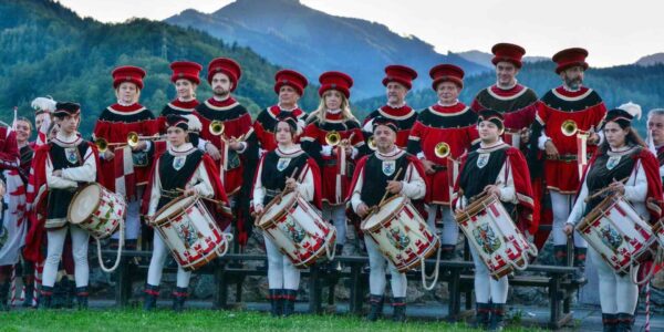 Flag-Wavers-And-Band-In-Historical-Dress